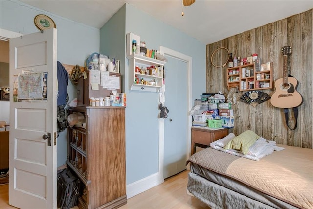 bedroom featuring wood finished floors