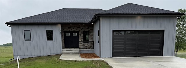 284 SW 1311th Rd, Holden, MO 64040 - view of front of home with driveway, a garage, and a shingled roof