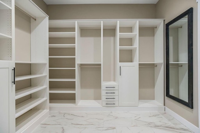 284 SW 1311th Rd, Holden, MO 64040 - walk in closet with marble look tiles