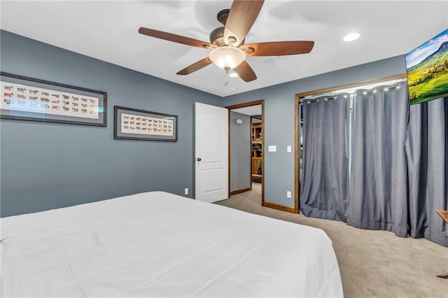bedroom featuring carpet flooring, ceiling fan, and baseboards