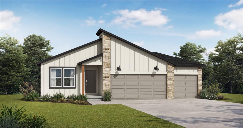 modern farmhouse featuring board and batten siding, an attached garage, a front lawn, and concrete driveway