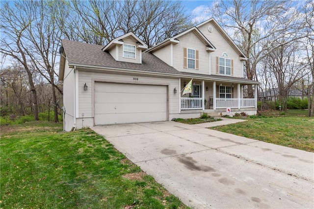 808 S Mohican Dr, Independence, MO 64056 - traditional-style home featuring a porch, an attached garage, concrete driveway, and a front lawn