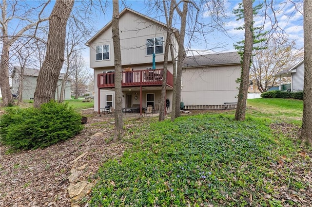 808 S Mohican Dr, Independence, MO 64056 - rear view of house with a deck