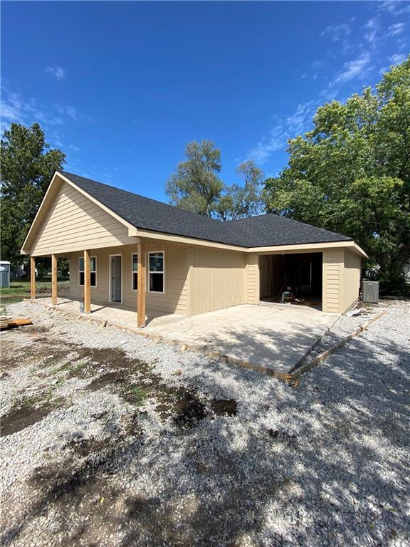 606 Pearl St, East Lynne, MO 64743 - photo 1