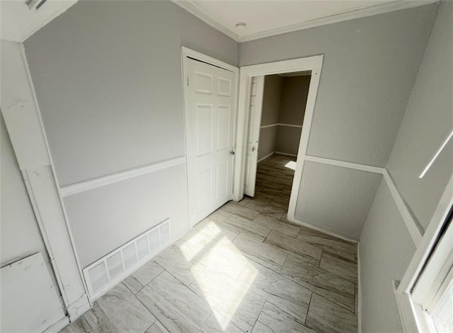 2907 E 61st St, Kansas City, MO 64130 - hallway featuring ornamental molding