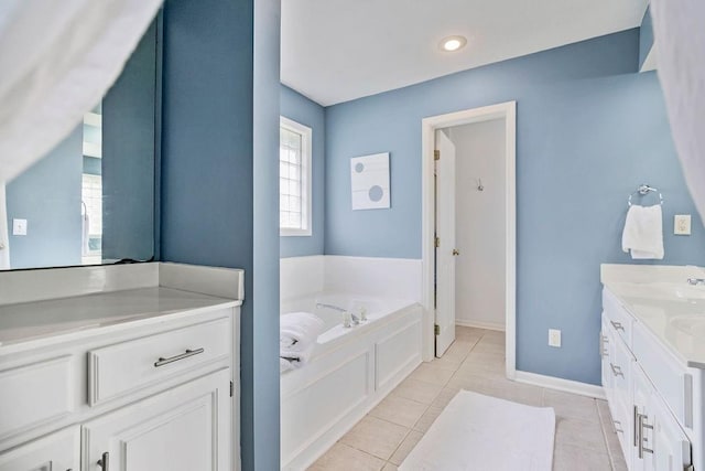 9011 NE 91st Ter, Kansas City, MO 64157 - full bathroom with vanity, a bath, tile patterned flooring, and baseboards