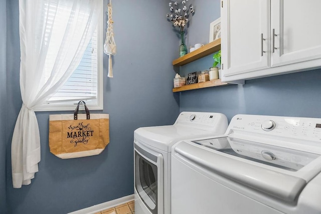 9011 NE 91st Ter, Kansas City, MO 64157 - laundry room with washing machine and dryer, cabinet space, and baseboards