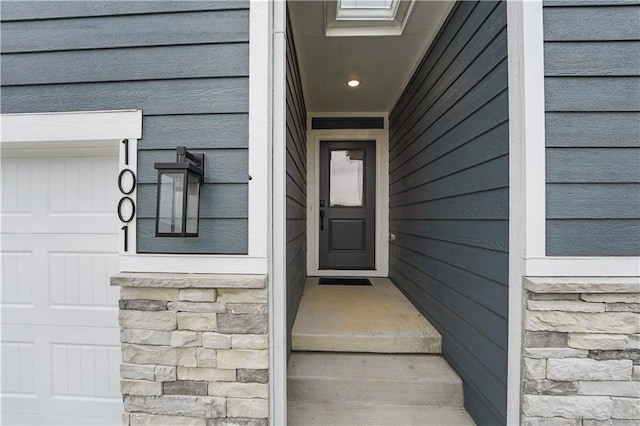 1001 Branchwood Ln, Raymore, MO 64083 - doorway to property with stone siding