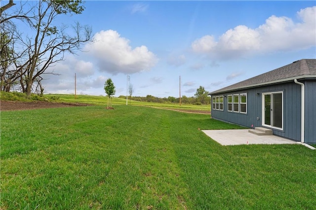 1001 Branchwood Ln, Raymore, MO 64083 - view of yard with a patio area