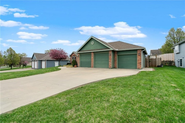 16011 Cedar St, Basehor, KS 66007 - ranch-style house with concrete driveway, a garage, and brick siding