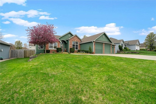 16011 Cedar St, Basehor, KS 66007 - view of front of house with brick siding, driveway, and an attached garage