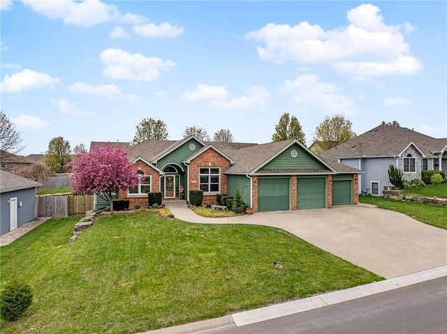 16011 Cedar St, Basehor, KS 66007 - view of front of house featuring a garage, brick siding, and driveway