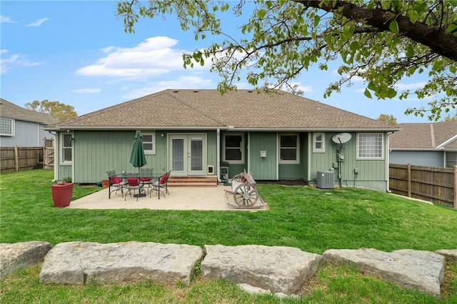 16011 Cedar St, Basehor, KS 66007 - rear view of property with french doors, central AC unit, a patio, and roof with shingles