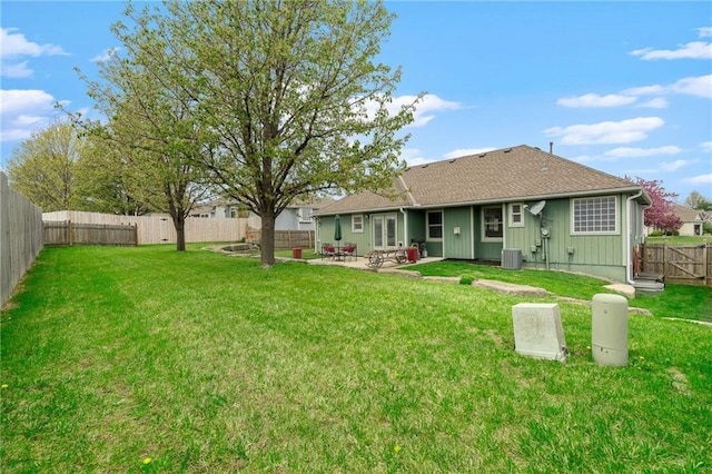 16011 Cedar St, Basehor, KS 66007 - rear view of house featuring central AC unit and a patio area