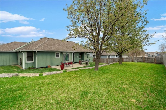 16011 Cedar St, Basehor, KS 66007 - back of house featuring a patio area and roof with shingles