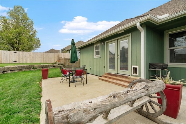 16011 Cedar St, Basehor, KS 66007 - view of patio with french doors, a grill, and entry steps