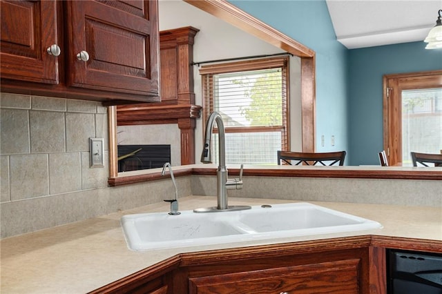 16011 Cedar St, Basehor, KS 66007 - kitchen with light countertops, healthy amount of natural light, and backsplash