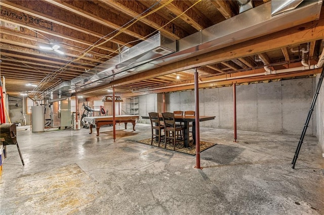 16011 Cedar St, Basehor, KS 66007 - unfinished below grade area featuring gas water heater, heating unit, and billiards table