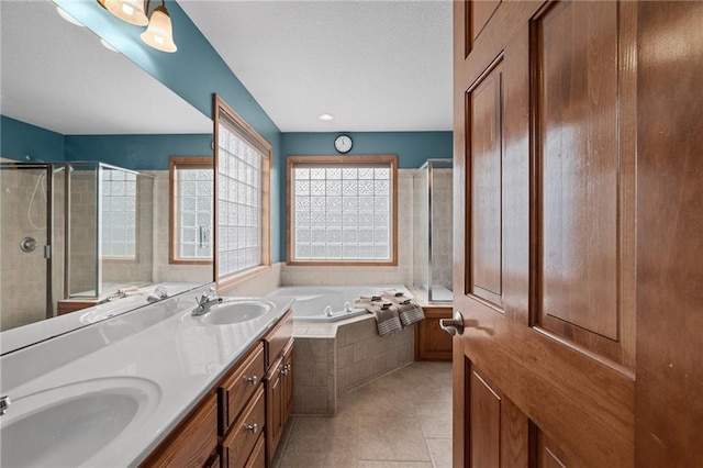 16011 Cedar St, Basehor, KS 66007 - full bath with a bath, double vanity, a shower stall, and tile patterned floors