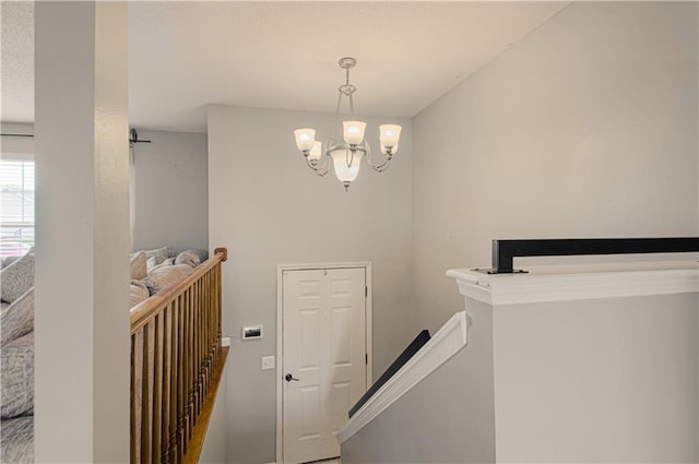 310 E 22nd St, Kearney, MO 64060 - stairs with a notable chandelier