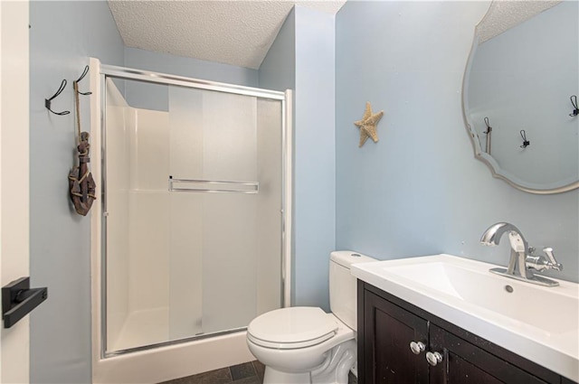 310 E 22nd St, Kearney, MO 64060 - full bathroom with a shower stall, a textured ceiling, toilet, and vanity