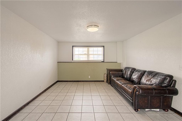 310 E 22nd St, Kearney, MO 64060 - living room with a textured wall, a textured ceiling, and baseboards