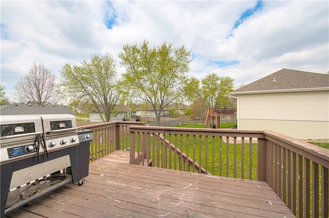 310 E 22nd St, Kearney, MO 64060 - deck with grilling area and a lawn