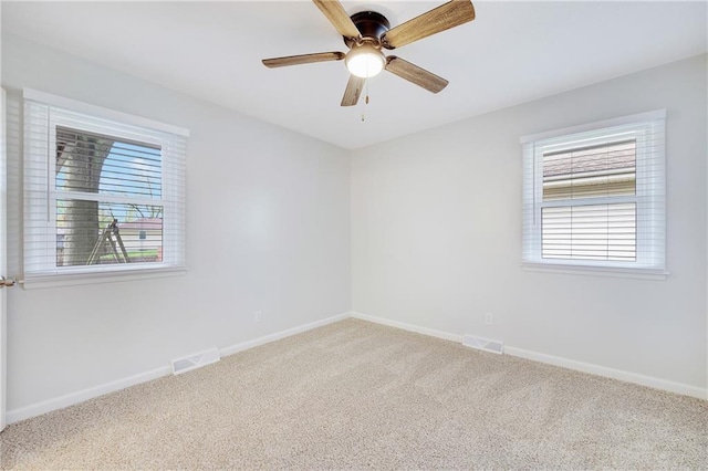 108 W Walnut St, Blue Springs, MO 64015 - unfurnished room featuring visible vents, carpet, and a healthy amount of sunlight