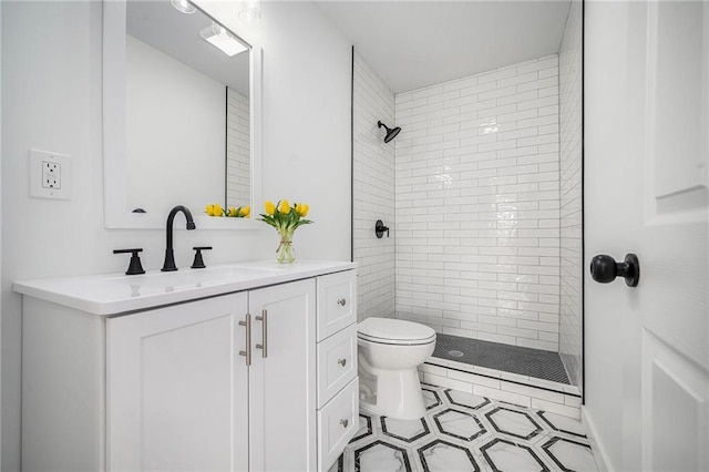 714 N Rogers St, Independence, MO 64050 - full bathroom featuring tiled shower, vanity, and tile patterned floors