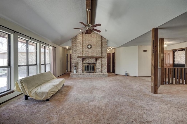 2301 S Stilwell St, Pittsburg, KS 66762 - living area featuring ceiling fan, light colored carpet, a brick fireplace, and lofted ceiling