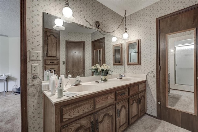 2301 S Stilwell St, Pittsburg, KS 66762 - full bathroom with a textured ceiling, wallpapered walls, and a sink