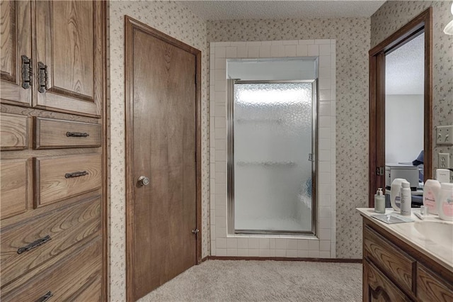 2301 S Stilwell St, Pittsburg, KS 66762 - full bathroom featuring vanity, a stall shower, and wallpapered walls