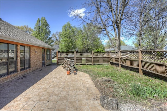 2301 S Stilwell St, Pittsburg, KS 66762 - view of yard with a patio and fence