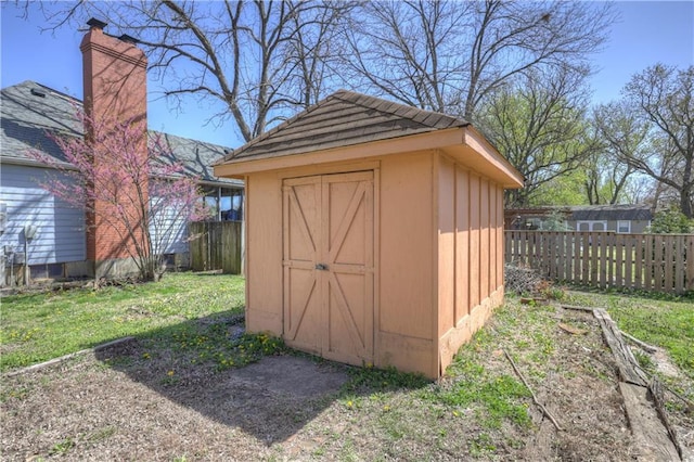 2301 S Stilwell St, Pittsburg, KS 66762 - view of shed featuring fence