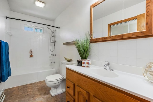 full bath featuring toilet, vanity, and shower / tub combination