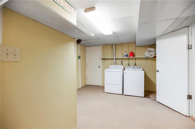 washroom with light colored carpet, laundry area, and independent washer and dryer