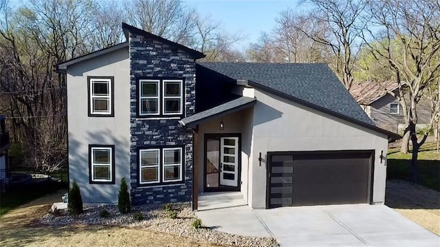 view of front of house featuring driveway, stucco siding, stone siding, and an attached garage
