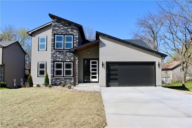 modern home with driveway, stone siding, an attached garage, and stucco siding