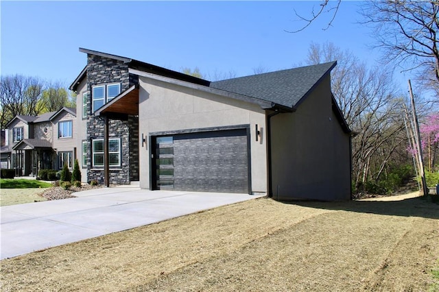 view of front of property featuring roof with shingles, stucco siding, driveway, stone siding, and an attached garage