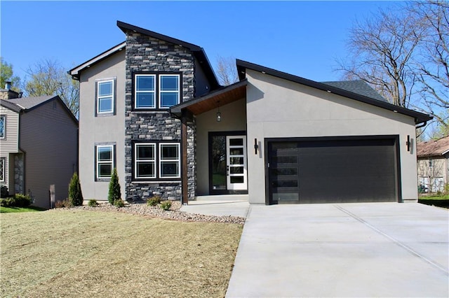modern home featuring stucco siding and stone siding