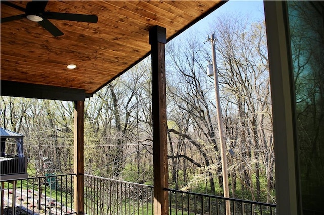 exterior space with ceiling fan