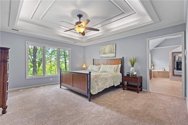 5316 NE Northgate Xing, Lees Summit, MO 64064 - bedroom featuring a raised ceiling, carpet floors, baseboards, a ceiling fan, and crown molding
