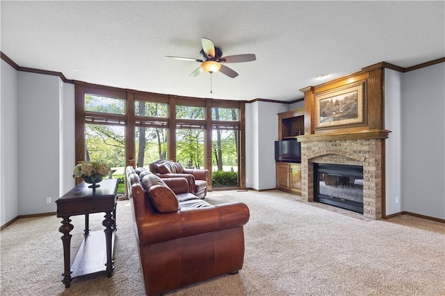 5316 NE Northgate Xing, Lees Summit, MO 64064 - living area featuring light carpet, ornamental molding, ceiling fan, a brick fireplace, and baseboards