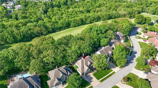 5316 NE Northgate Xing, Lees Summit, MO 64064 - aerial view of property and surrounding area featuring nearby suburban area and a forest