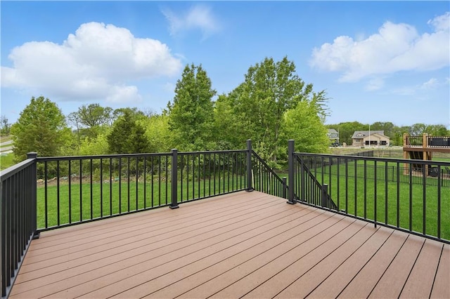 1002 Branchwood Ln, Raymore, MO 64083 - wooden deck featuring a yard