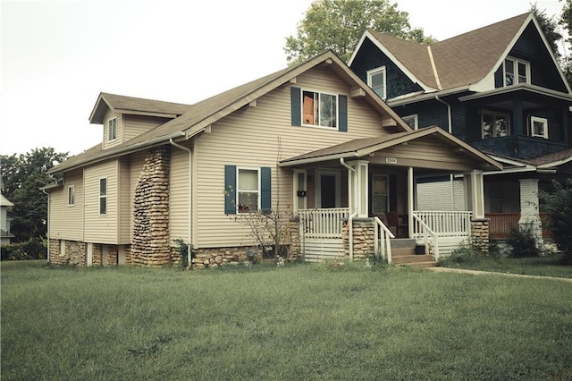 3344 S Benton Ave, Kansas City, MO 64128 - craftsman inspired home featuring a front lawn and covered porch