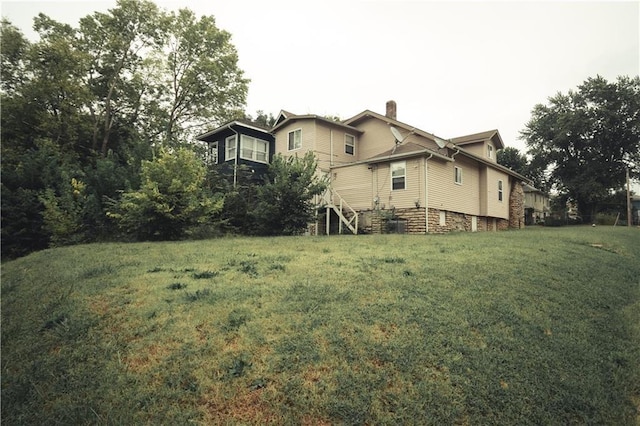 3344 S Benton Ave, Kansas City, MO 64128 - view of yard featuring stairway