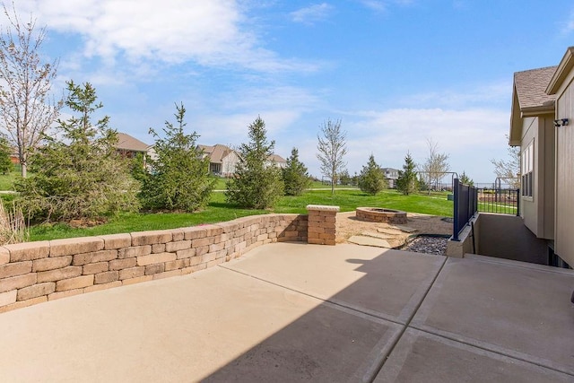 view of patio featuring a fire pit
