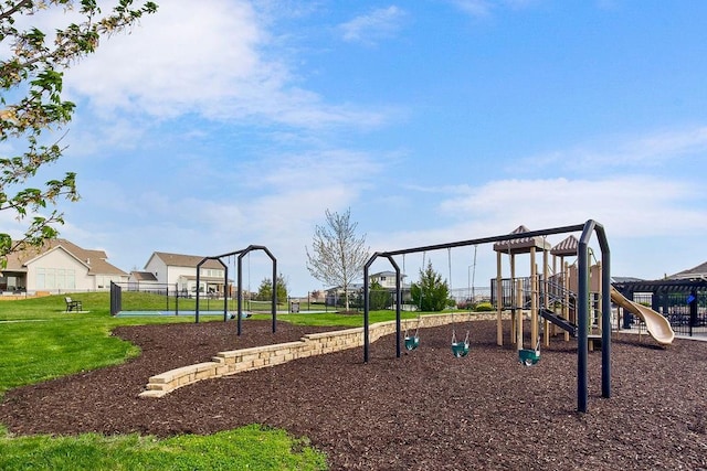 community jungle gym featuring a yard