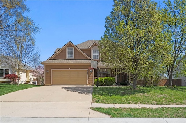 view of front of home with fence, a front yard, and concrete driveway